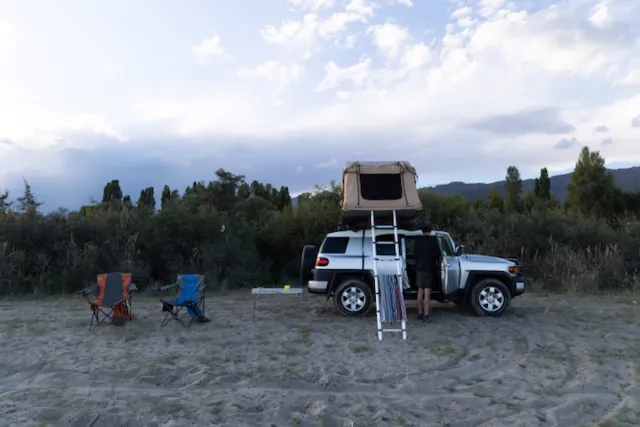 Camp by the river: digital photograph by Ben Enbom, Kyrgyzstan